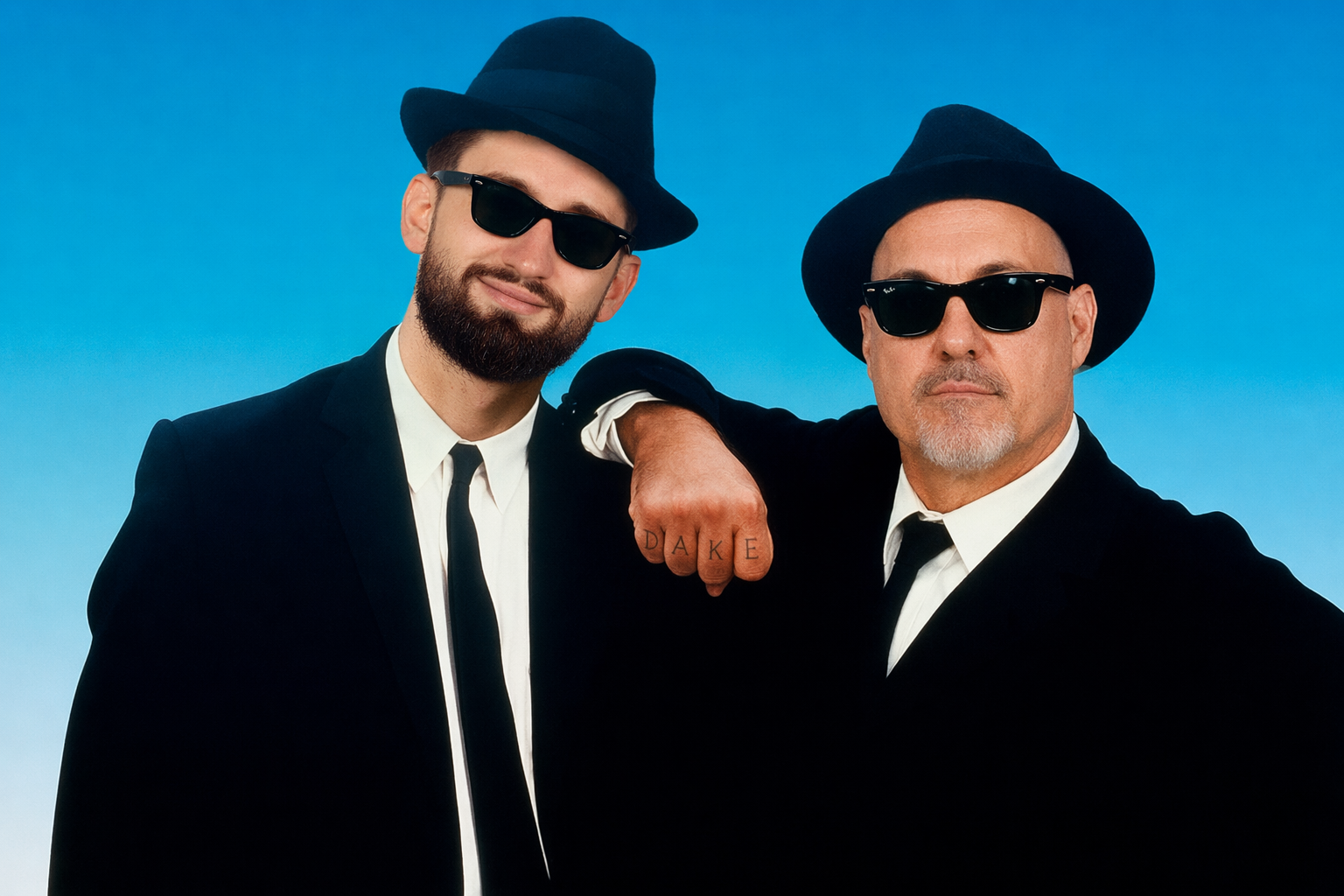 A picture of the Blues Brothers with the faces of Dan Vladar and Rick Tocchet superimposed.